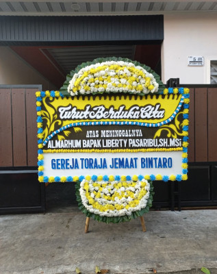 Papan Bunga Duka di Gunungjaya